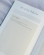2027 weekly planner and guided journal with end of year reflection journal prompts.