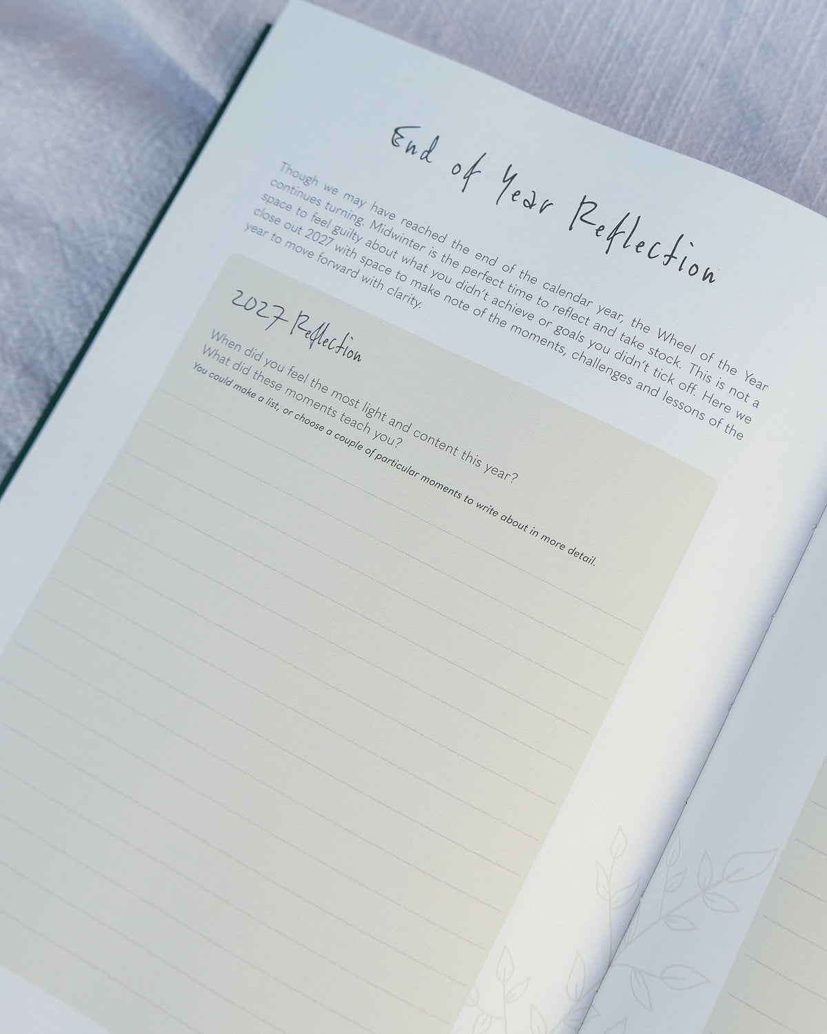 2027 weekly planner and guided journal with end of year reflection journal prompts.